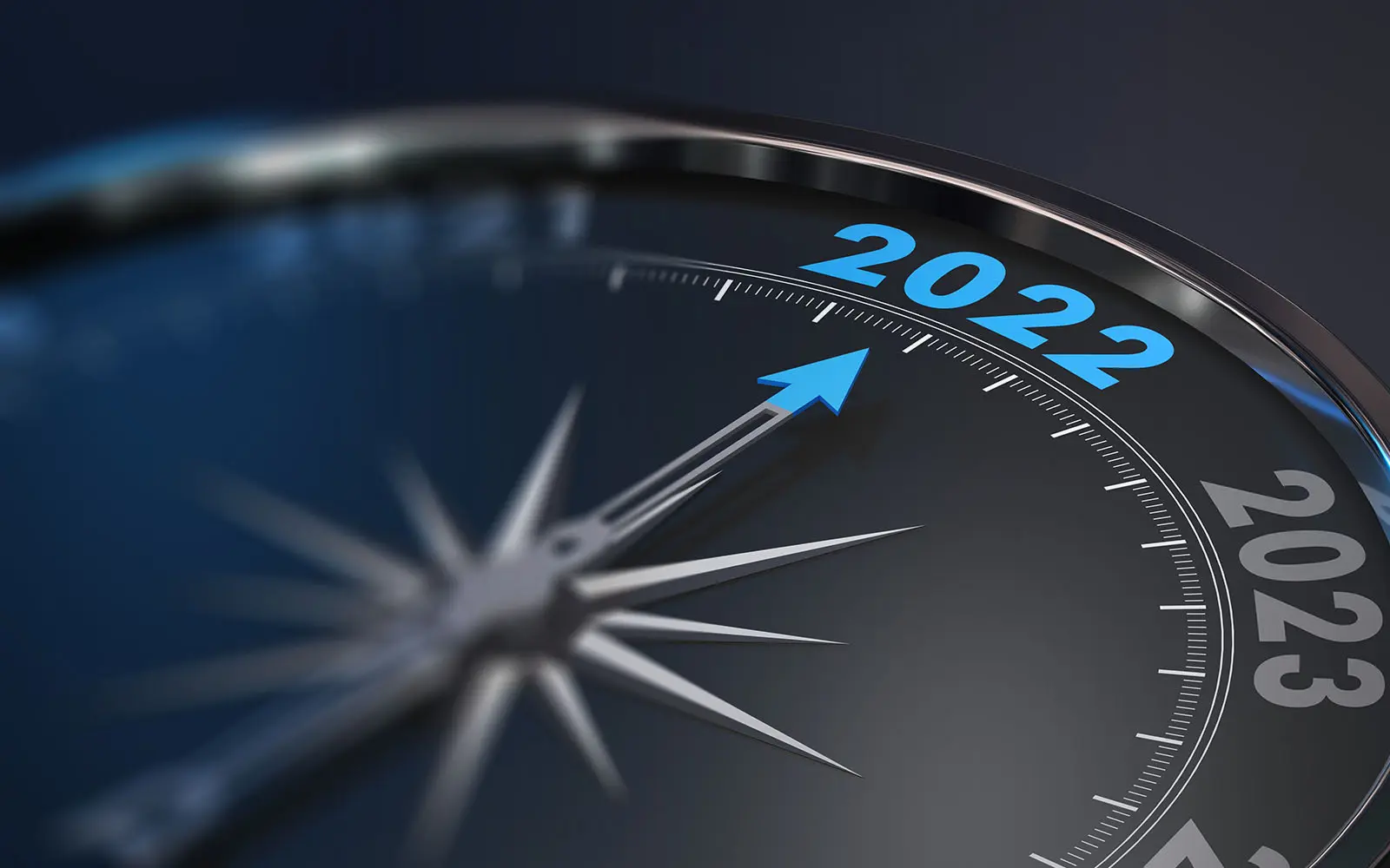 compass with years on it with the dial pointing at 2022