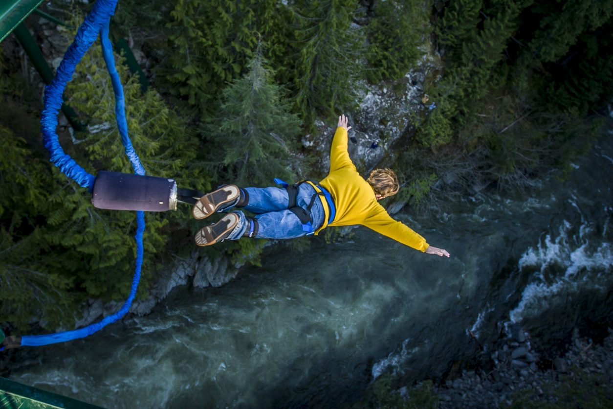 Man freefalling from bungee jump