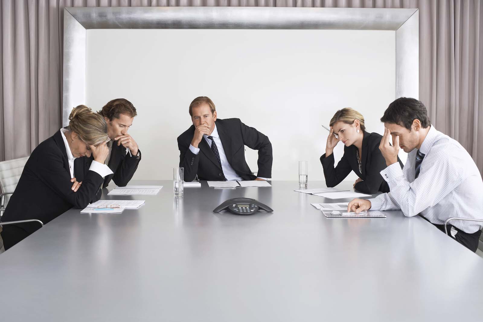 group of board members meeting around a table