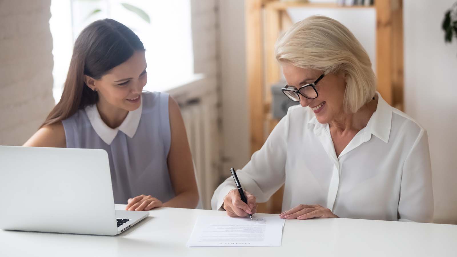 two people working at a desk