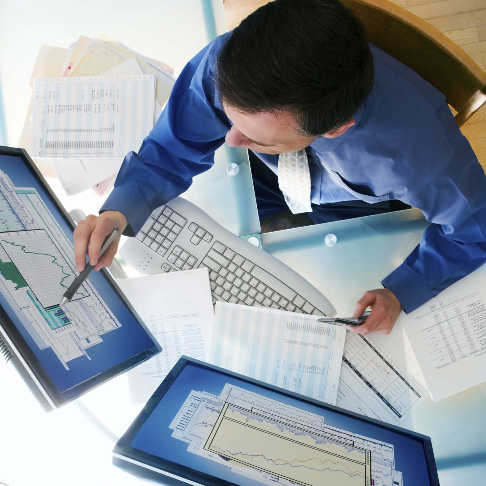 overhead view of a person working on a computer