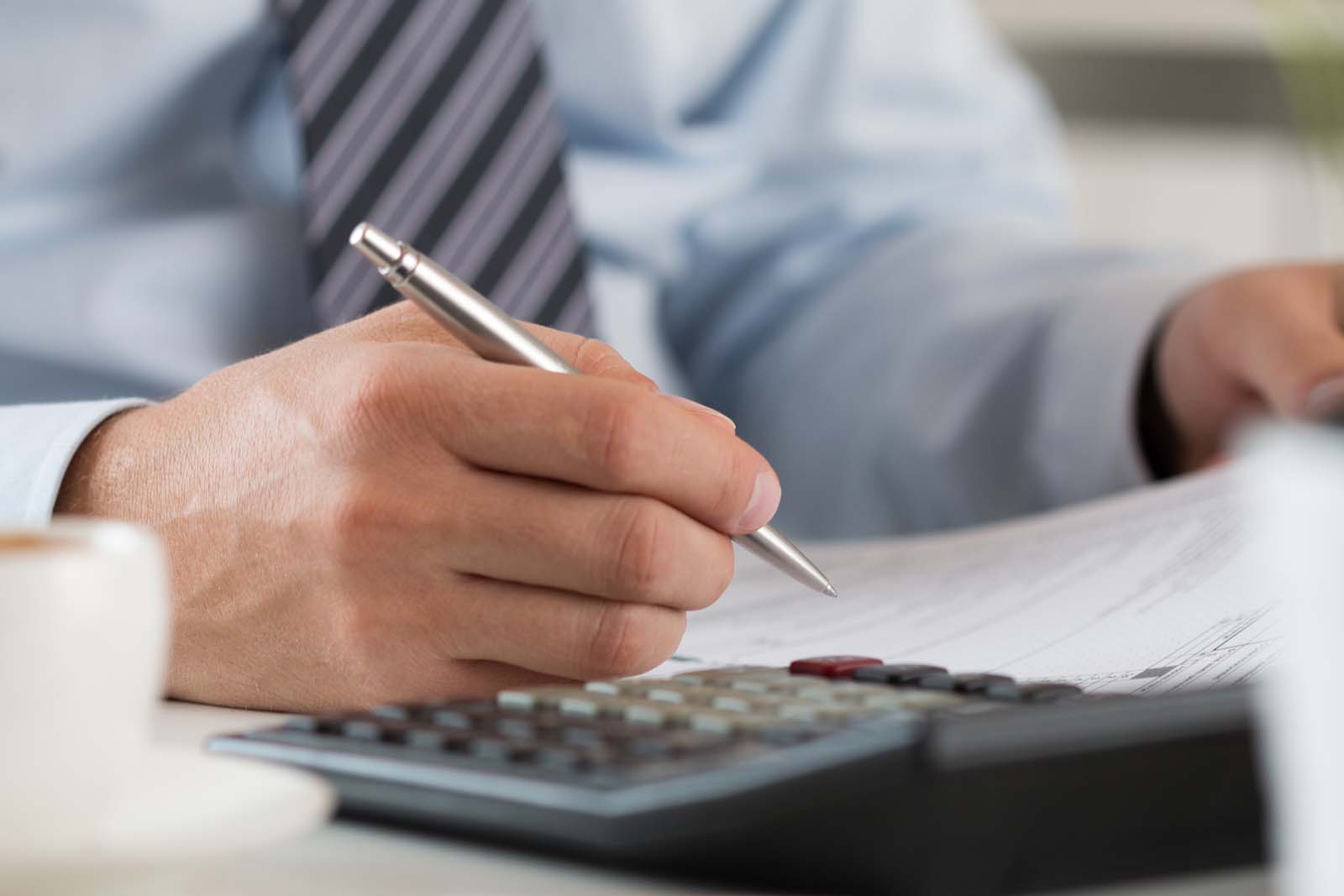 person working with a calculator