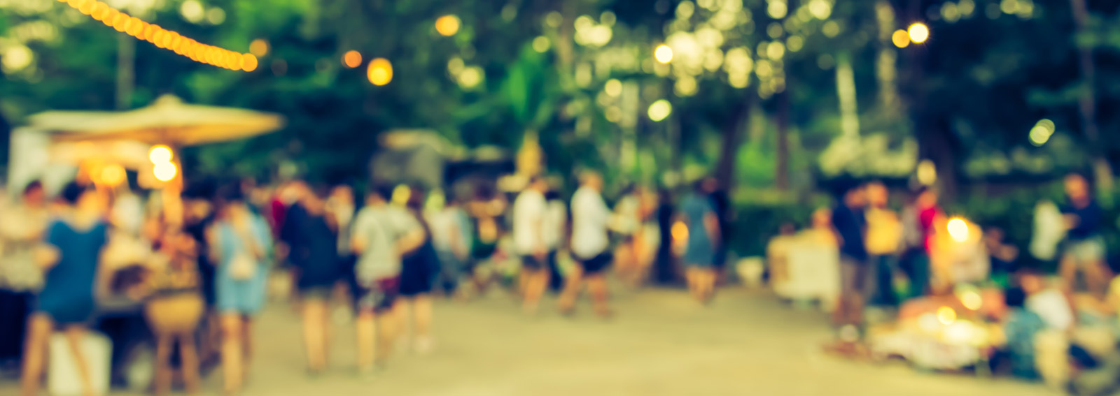Group of people outside at a social gathering