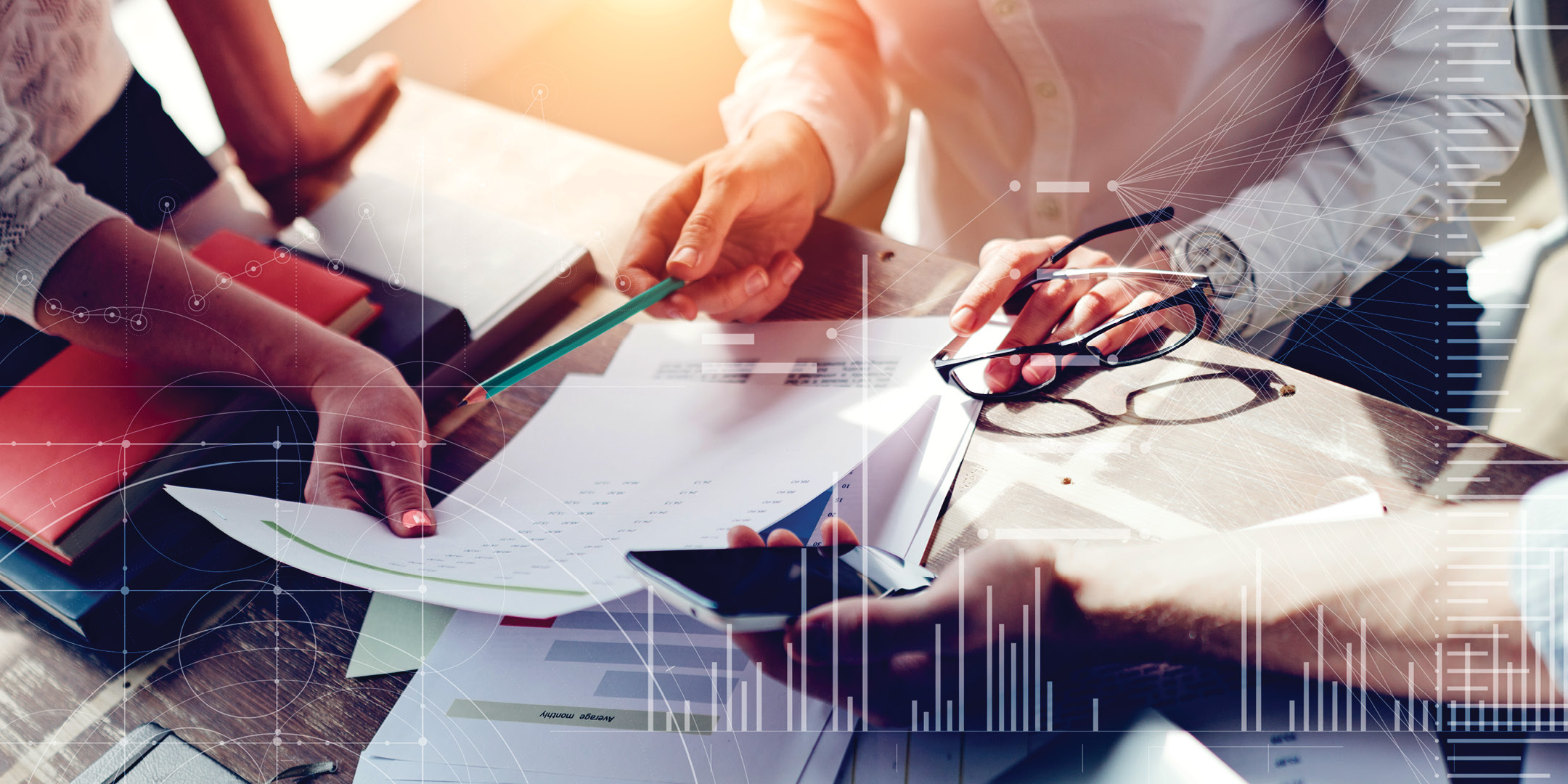 Business people analyzing reports 