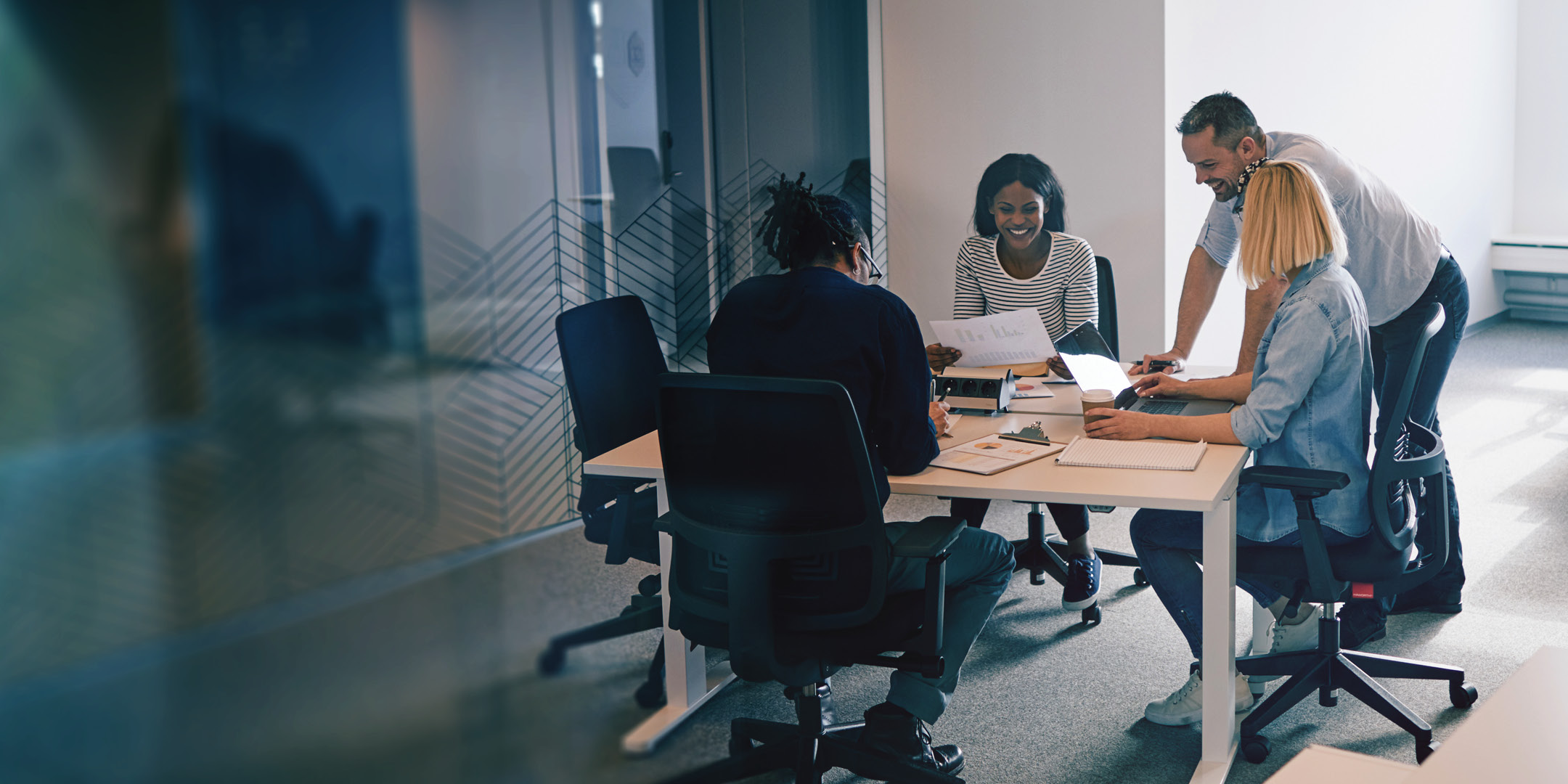 Business team conversing in a board room