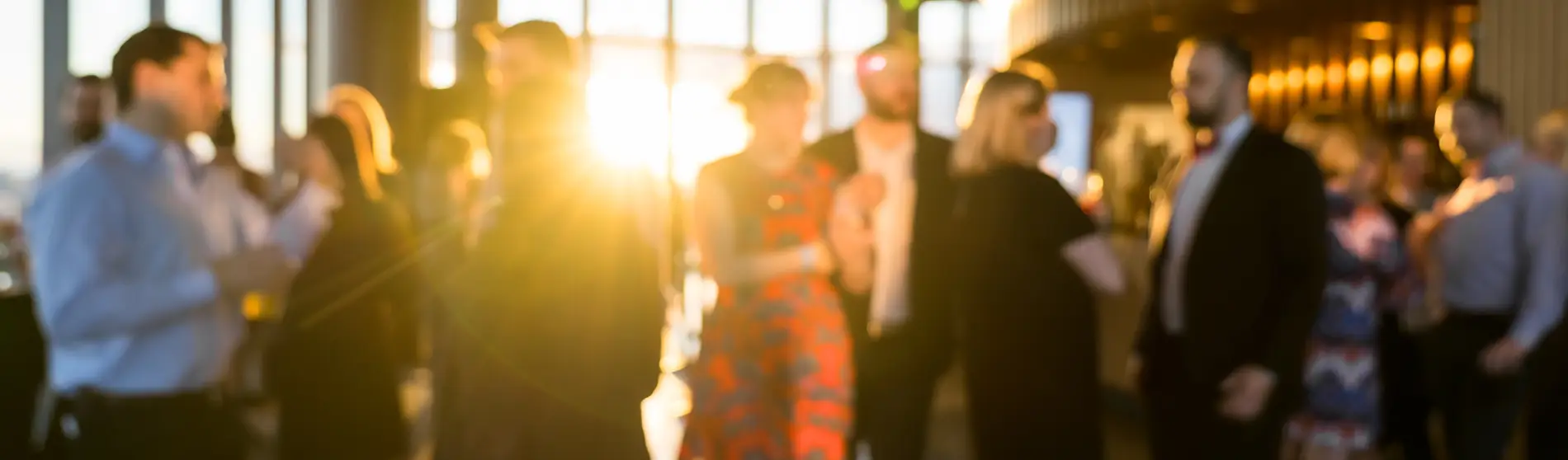 Blurred photo Crowd of unrecognizable business people standing and talking together