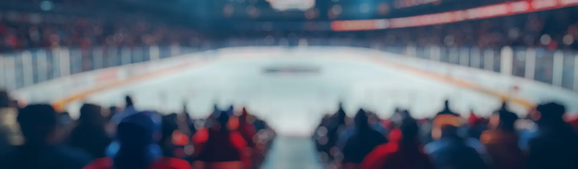 Blurred background of a bustling ice hockey rink before the start of the game