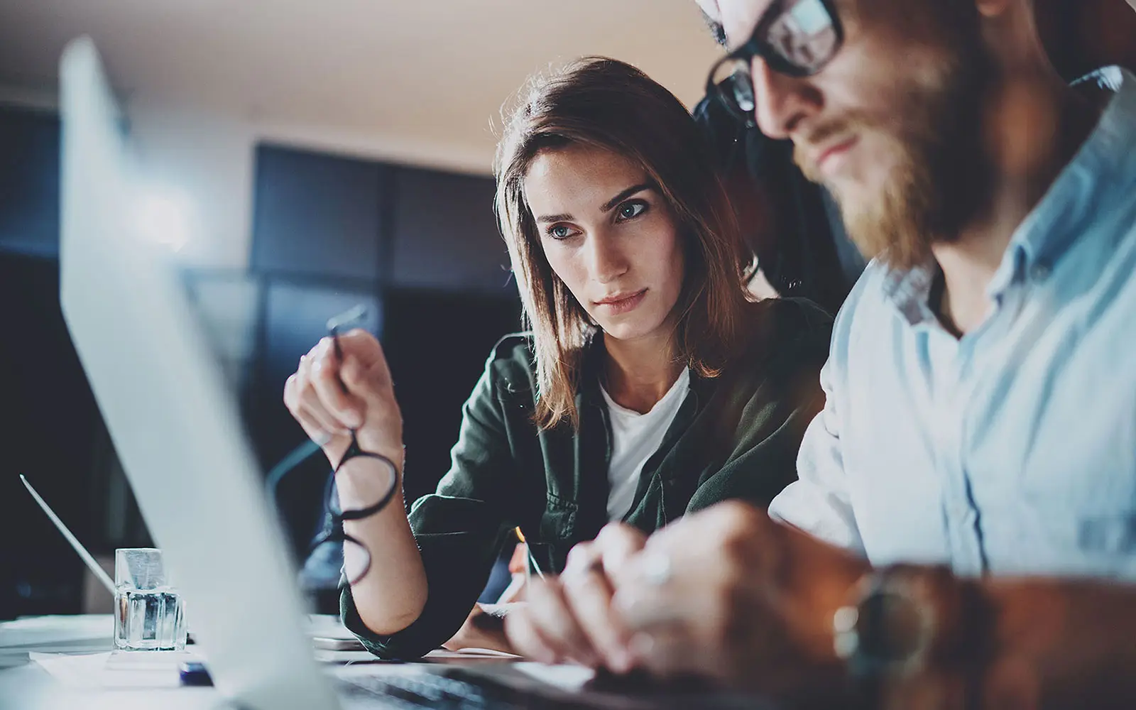 two business people looking at computer