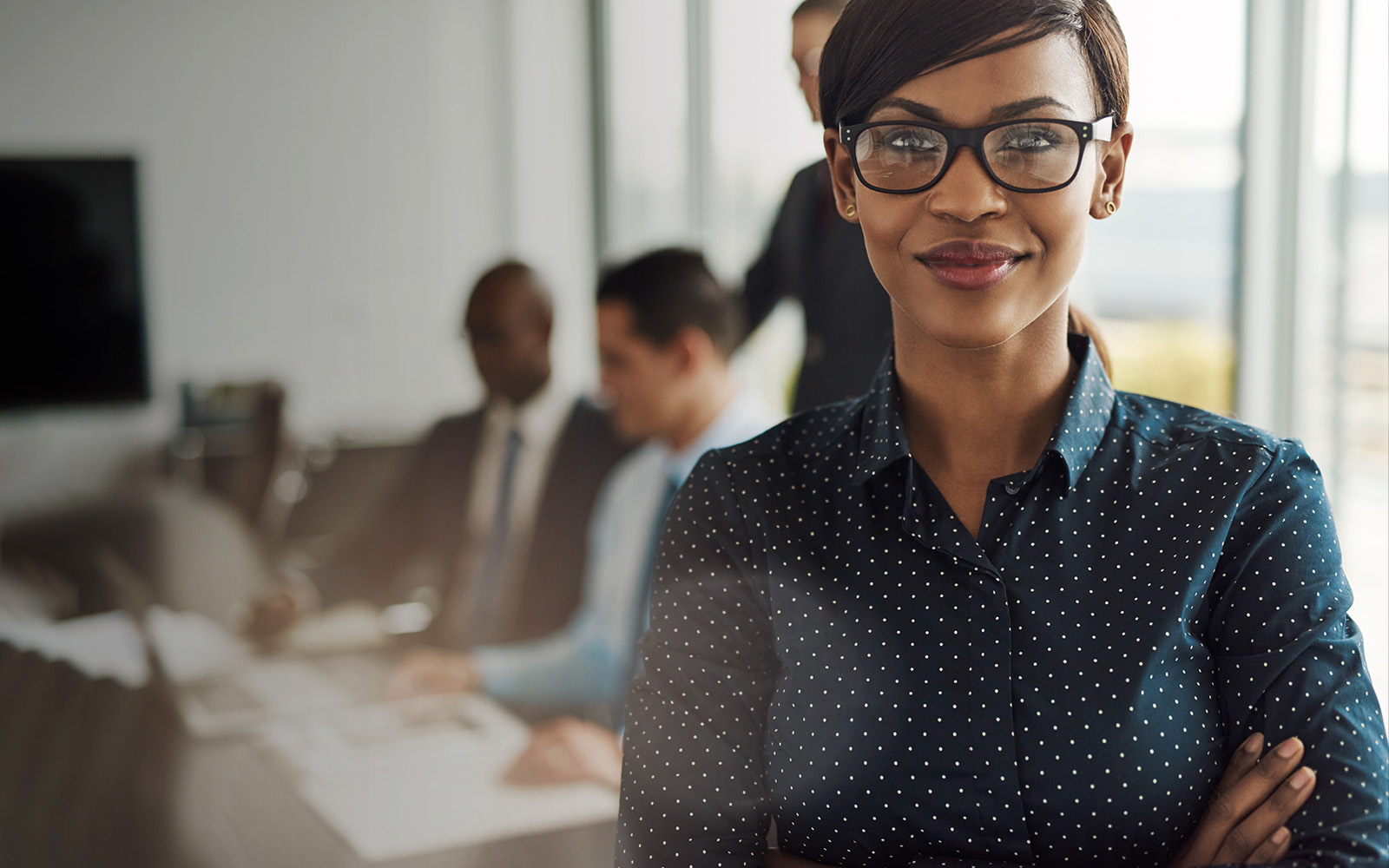 Woman in front of a business meeting