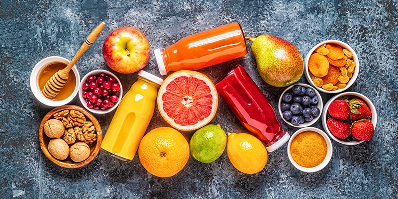 A flatlay of vegetables and food together on a table.