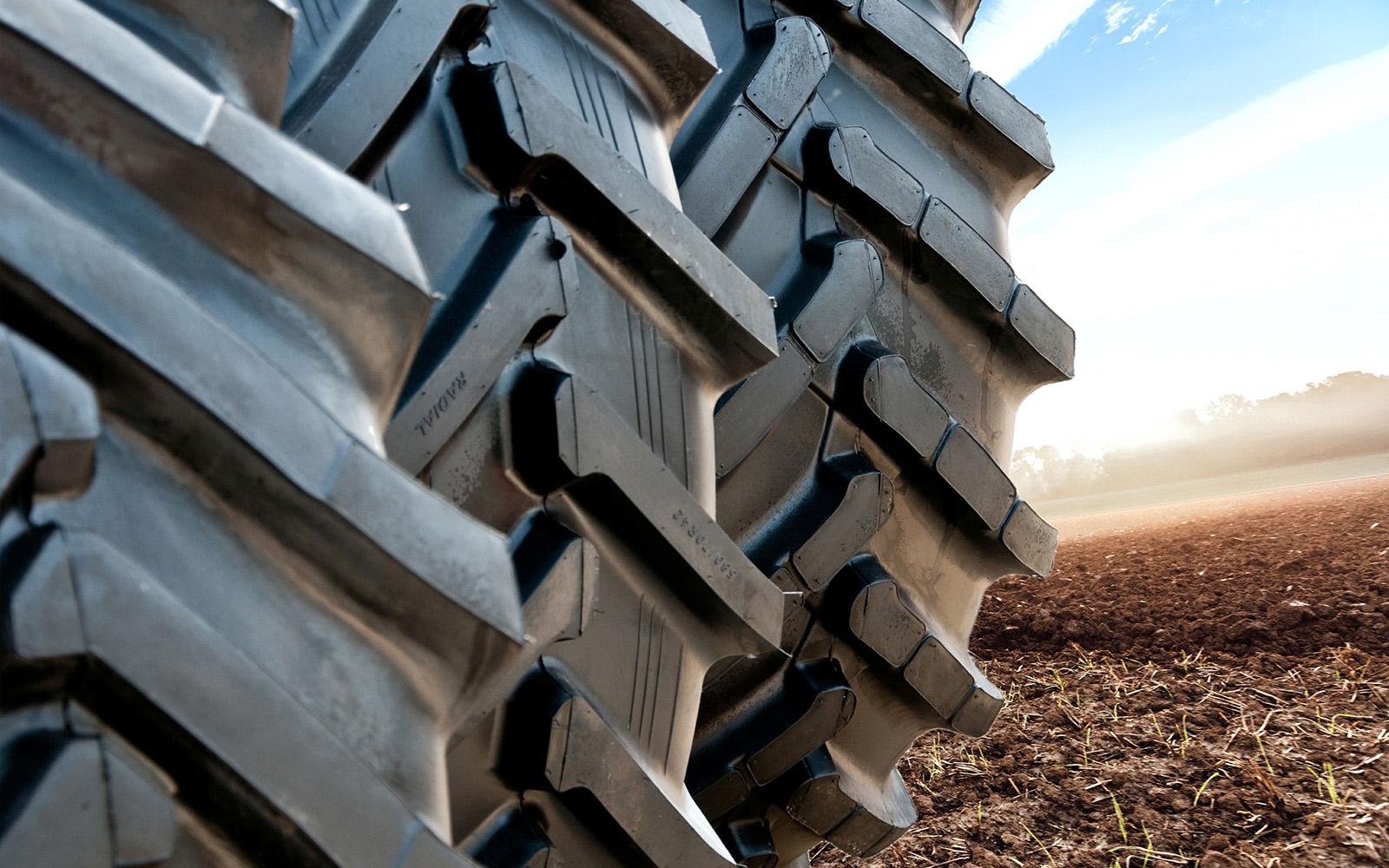 Stack of brand new tractor tires 