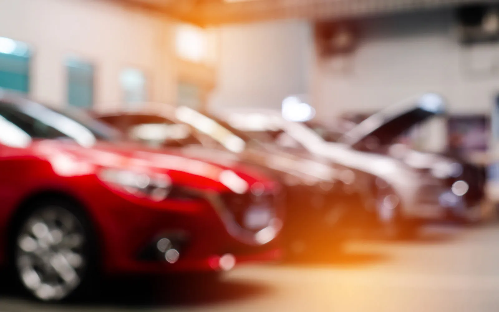Out of focus cars in a dealership