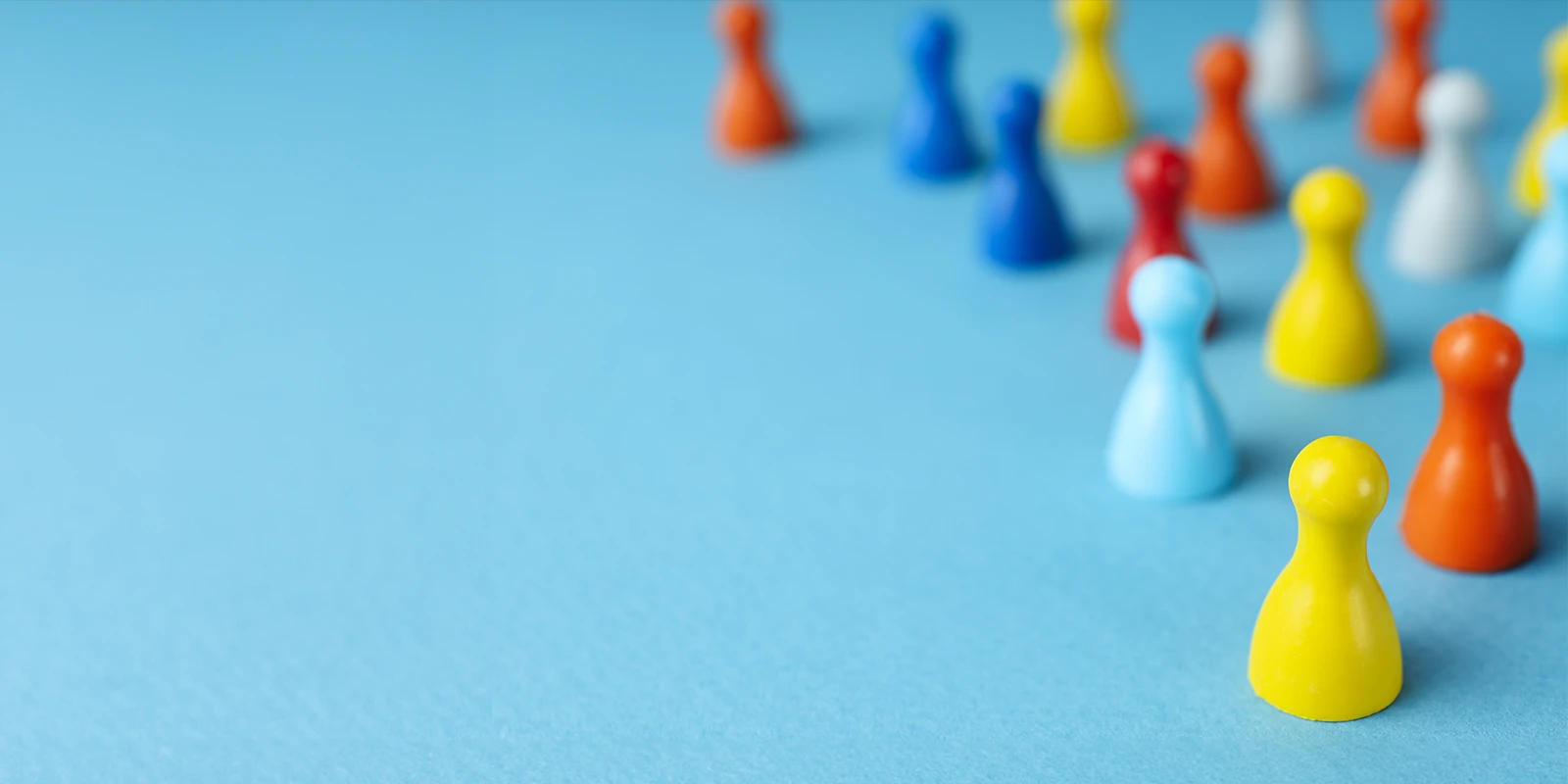 colorful game peices on a blue background