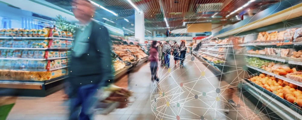 blurred image of people grocery shopping