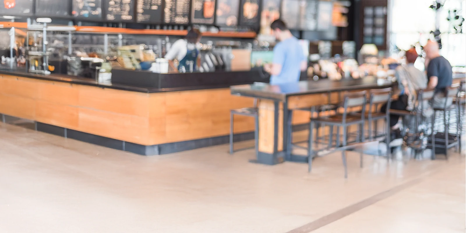 defocused photo of cusotmers at a coffee shop