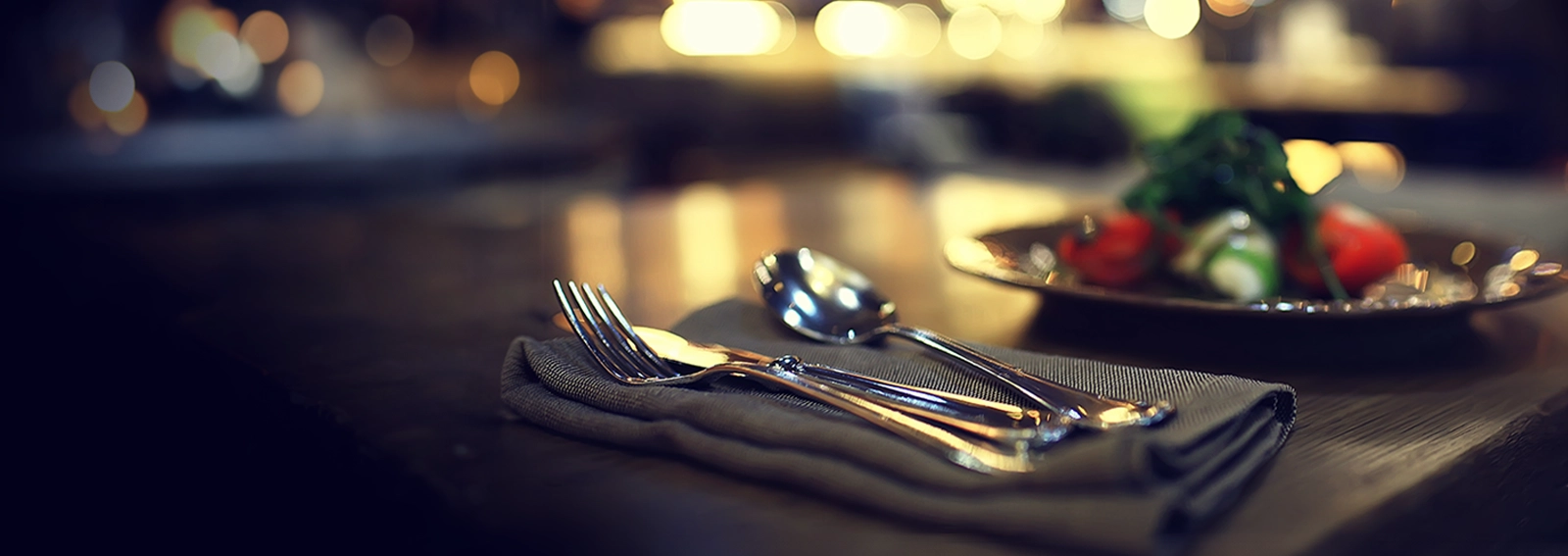 Image of cutlery laid out on table