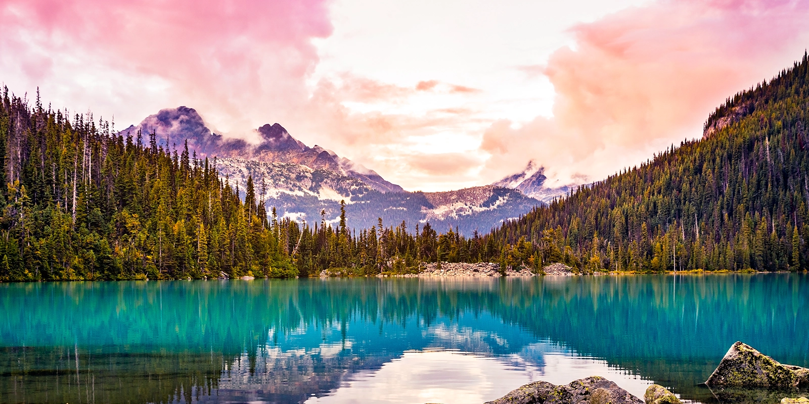 sunset mountain view over a blue lake