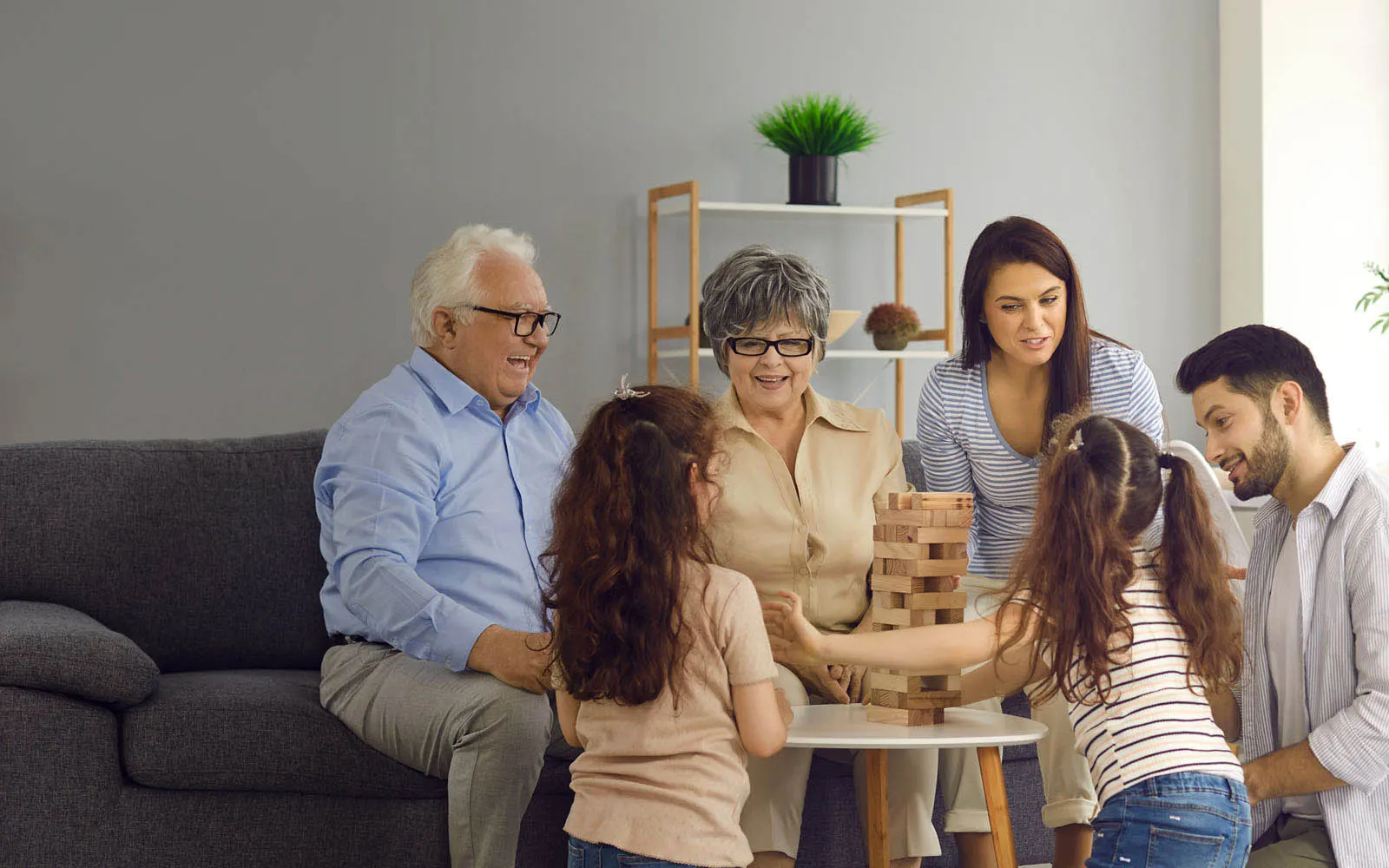 family sitting on couch bonding