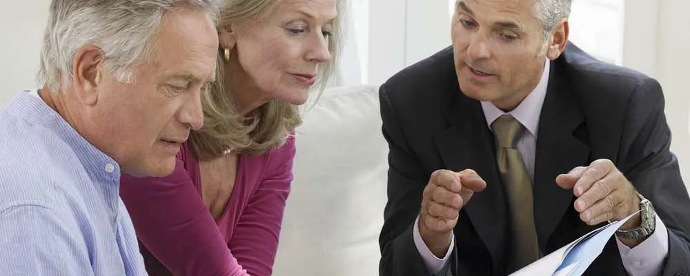 three business partners discussing plans