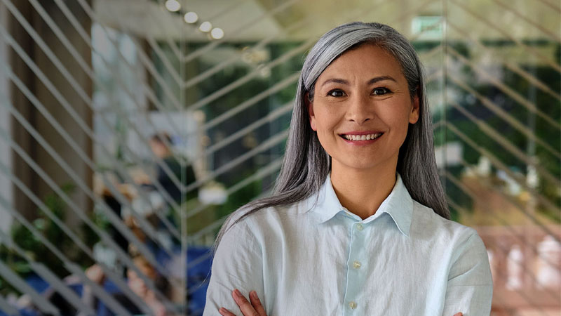 Woman standing and smiling