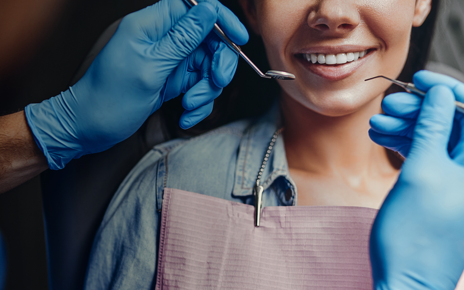 dentist working on the teeth of a patient