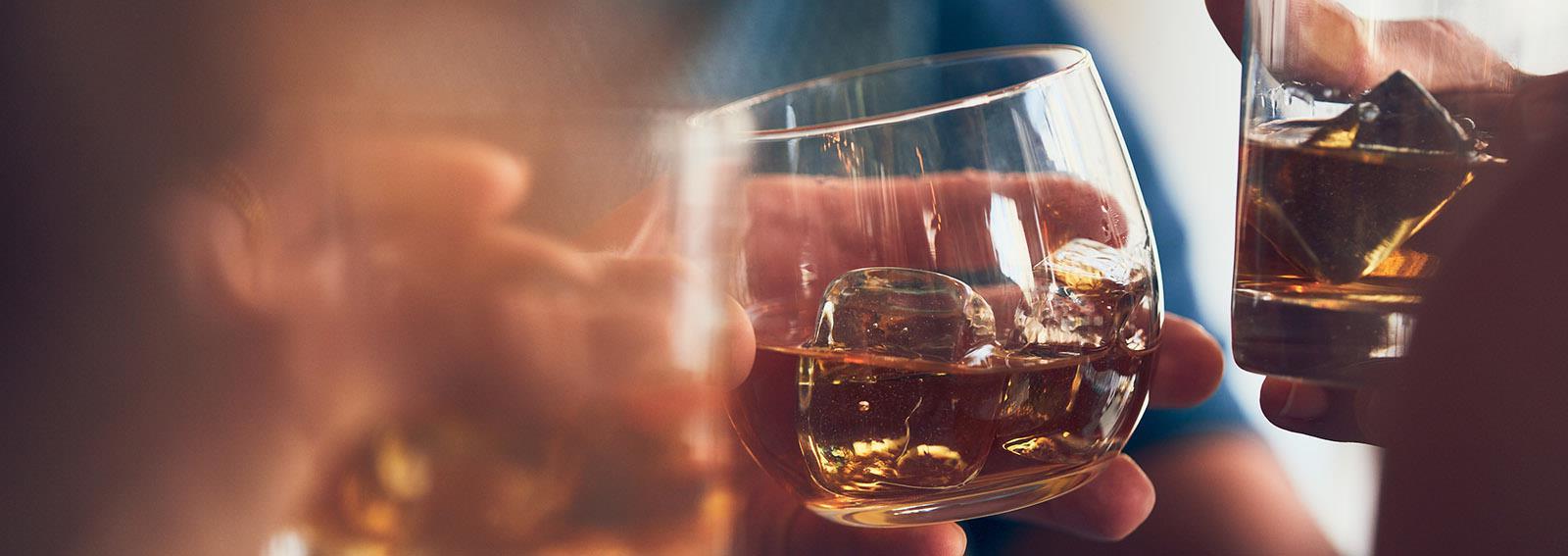 Glasses of scotch with ice.