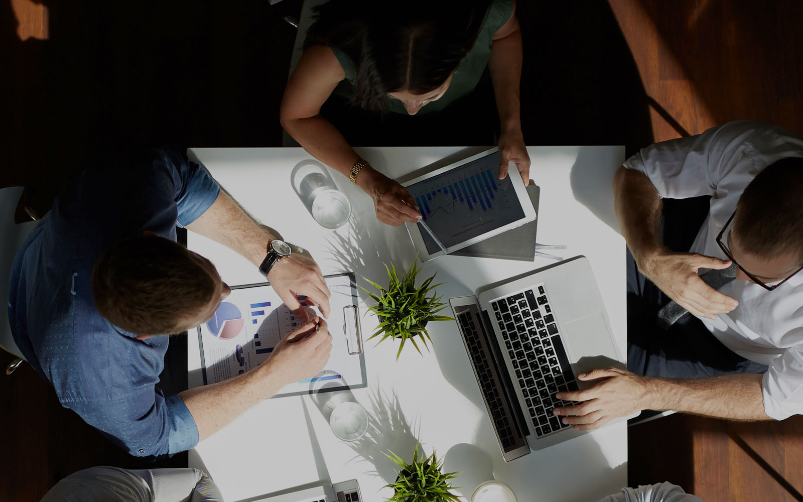 Three people having a meeting