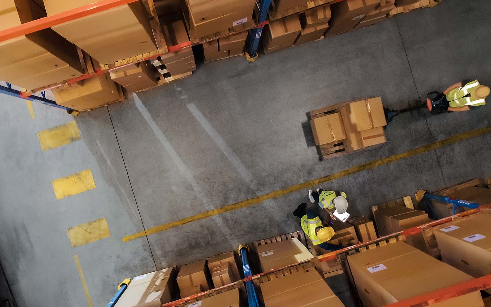 Worker Moving Goods in Retail Warehouse