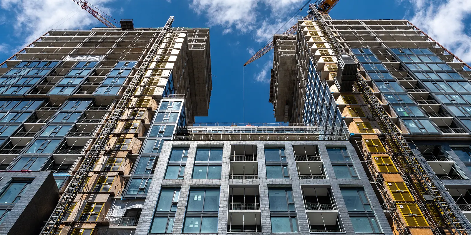 Construction site with a crane A concept of urban sprawl
