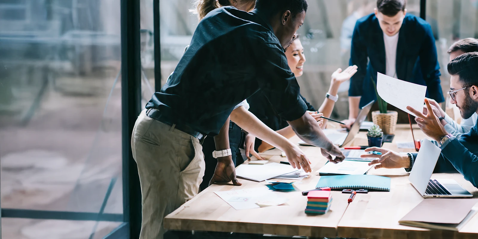 diverse team collaborating in a boardroom