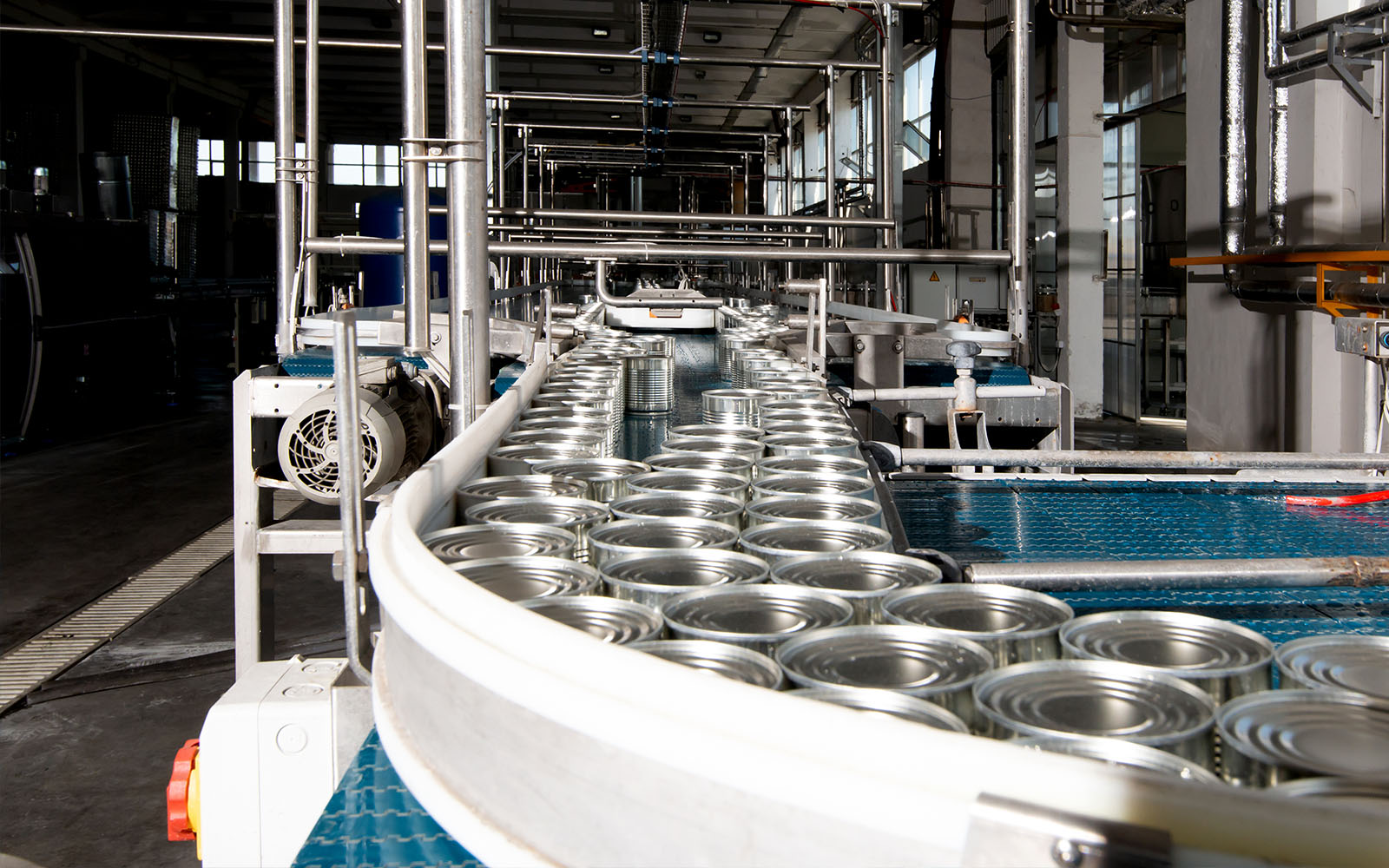 aluminum cans on conveyor belt