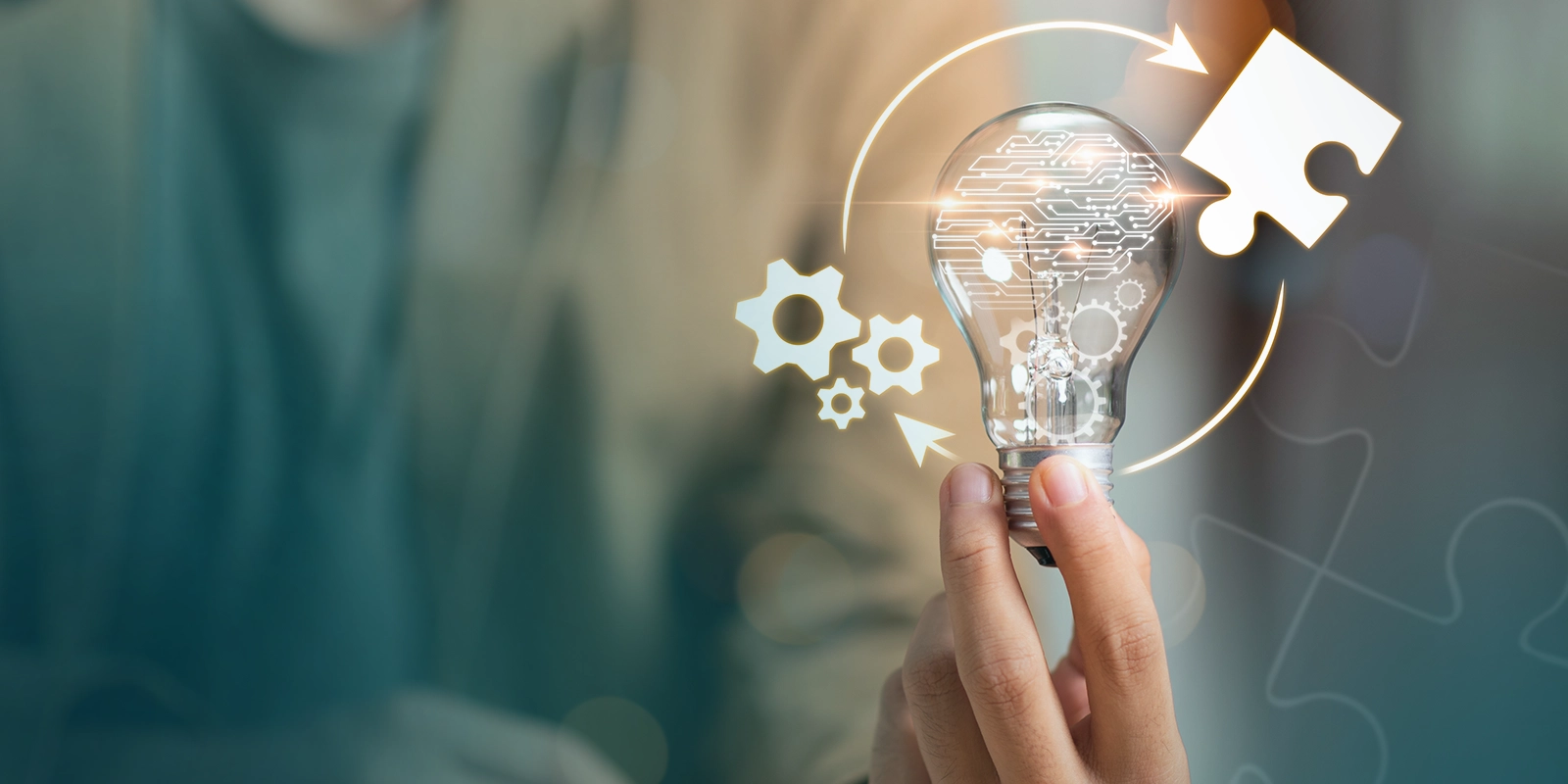 technology lightbulb circled by puzzle piece and gears