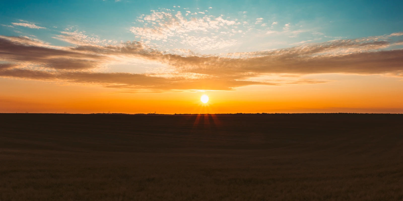 Dramatic sunet over a vast landscape