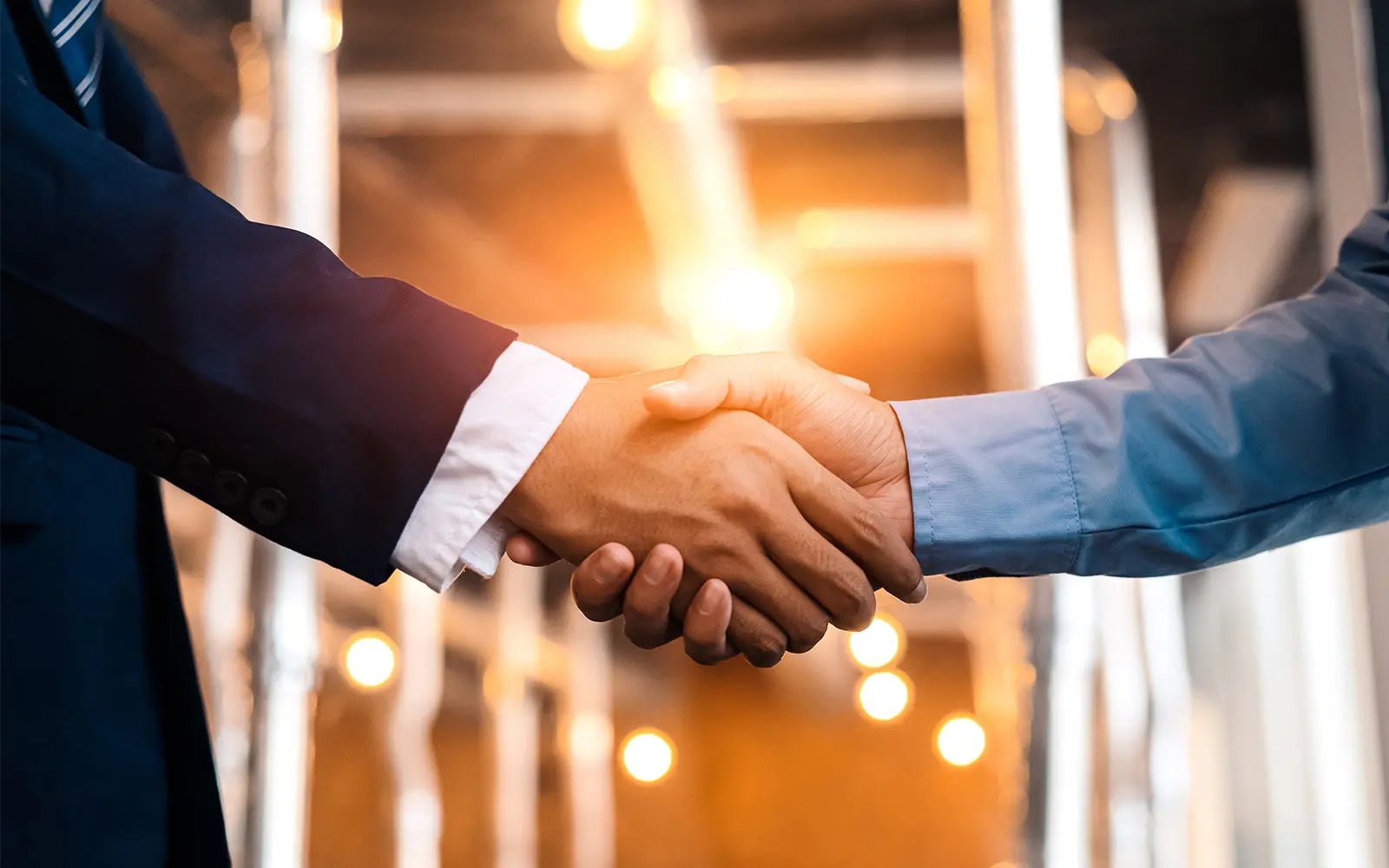 Close up of two people shaking hands