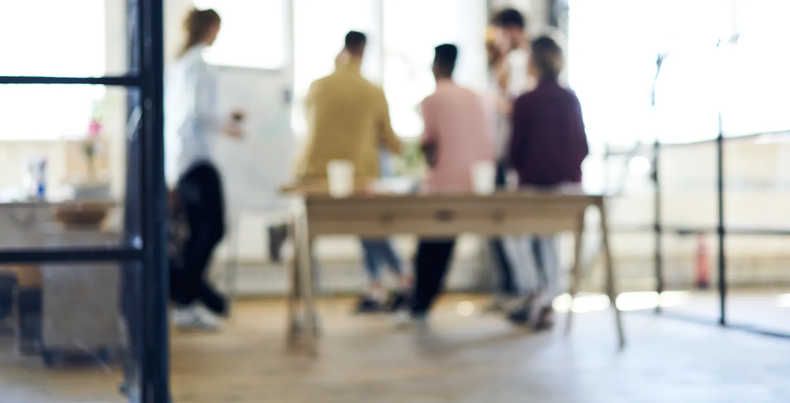 People collaborating in a board room