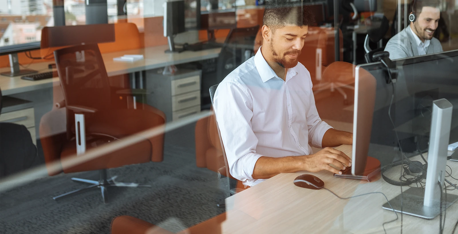 person working in IT managed services in an office setting