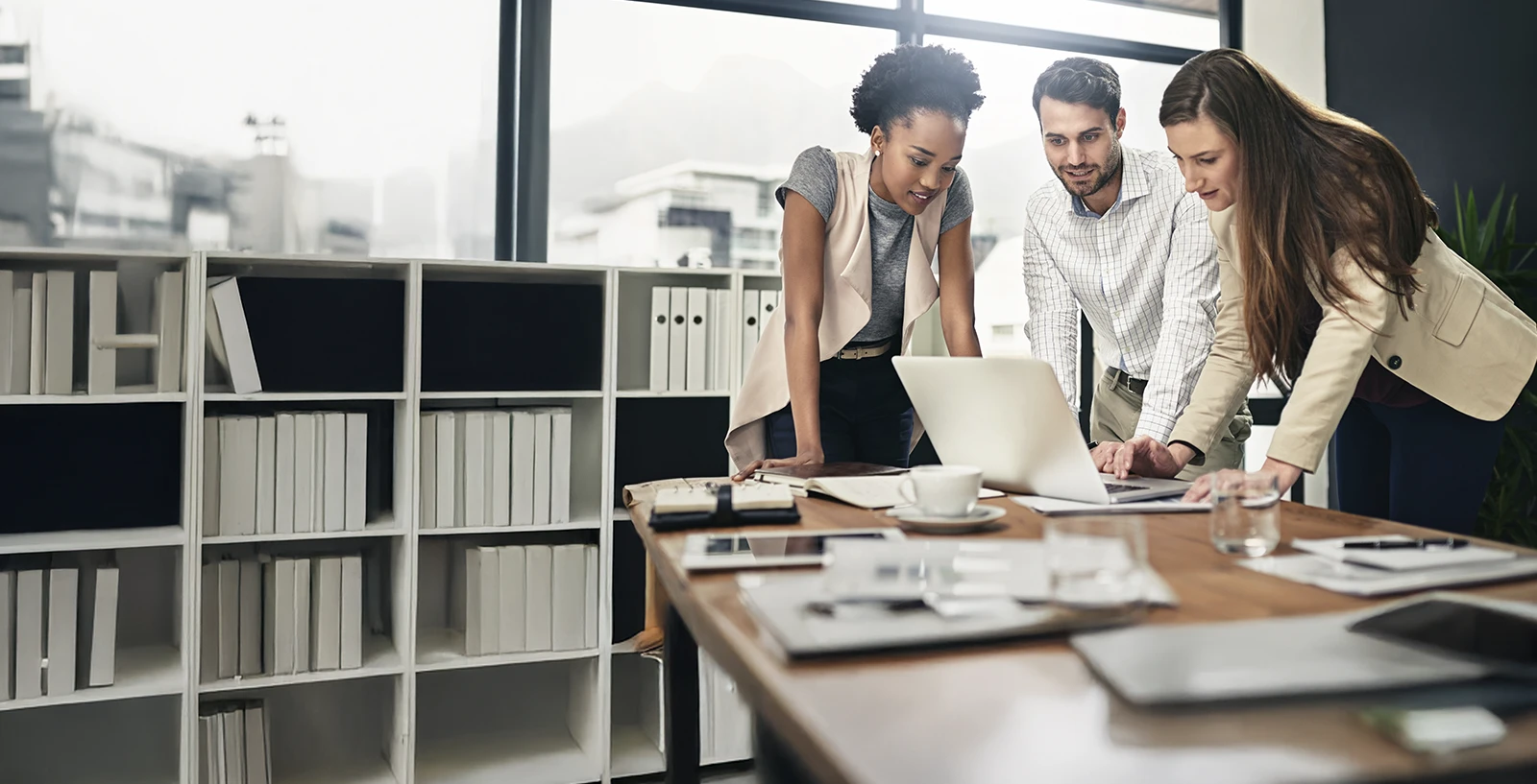 Project management team collaborating in a modern office