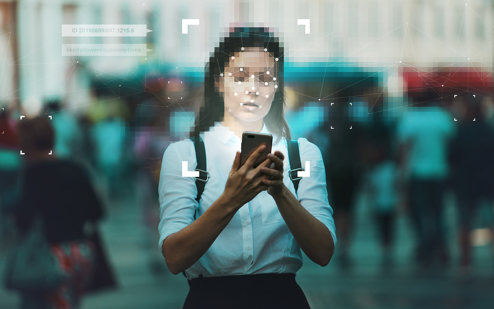 Woman unlocking her phone with facial verification.  