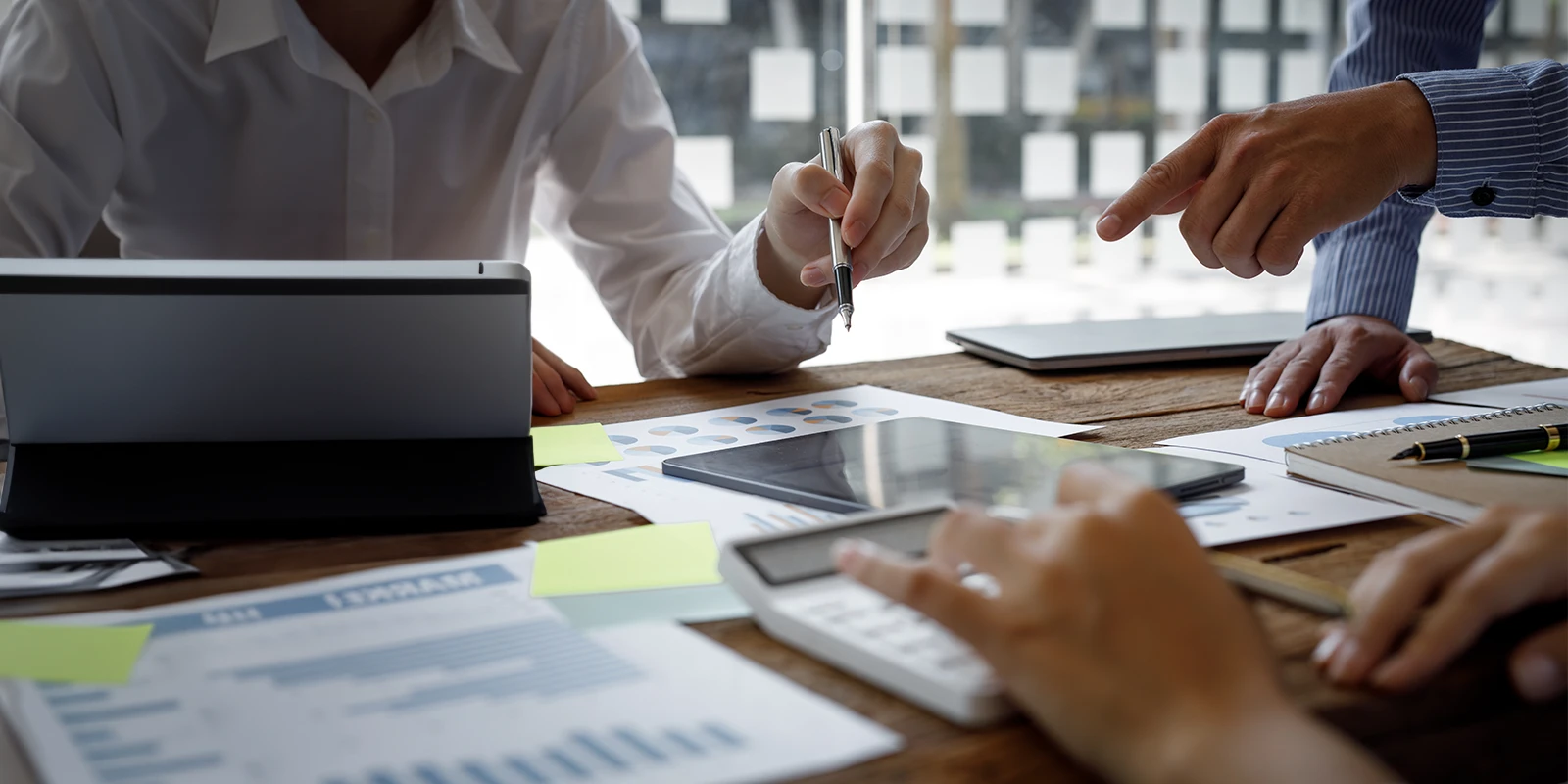 Audit team reviewing internal documents