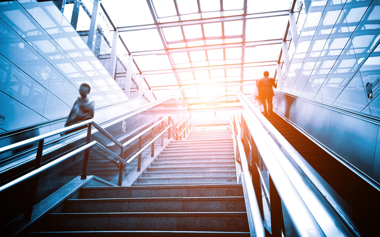 Staircase with the sun shining at the top