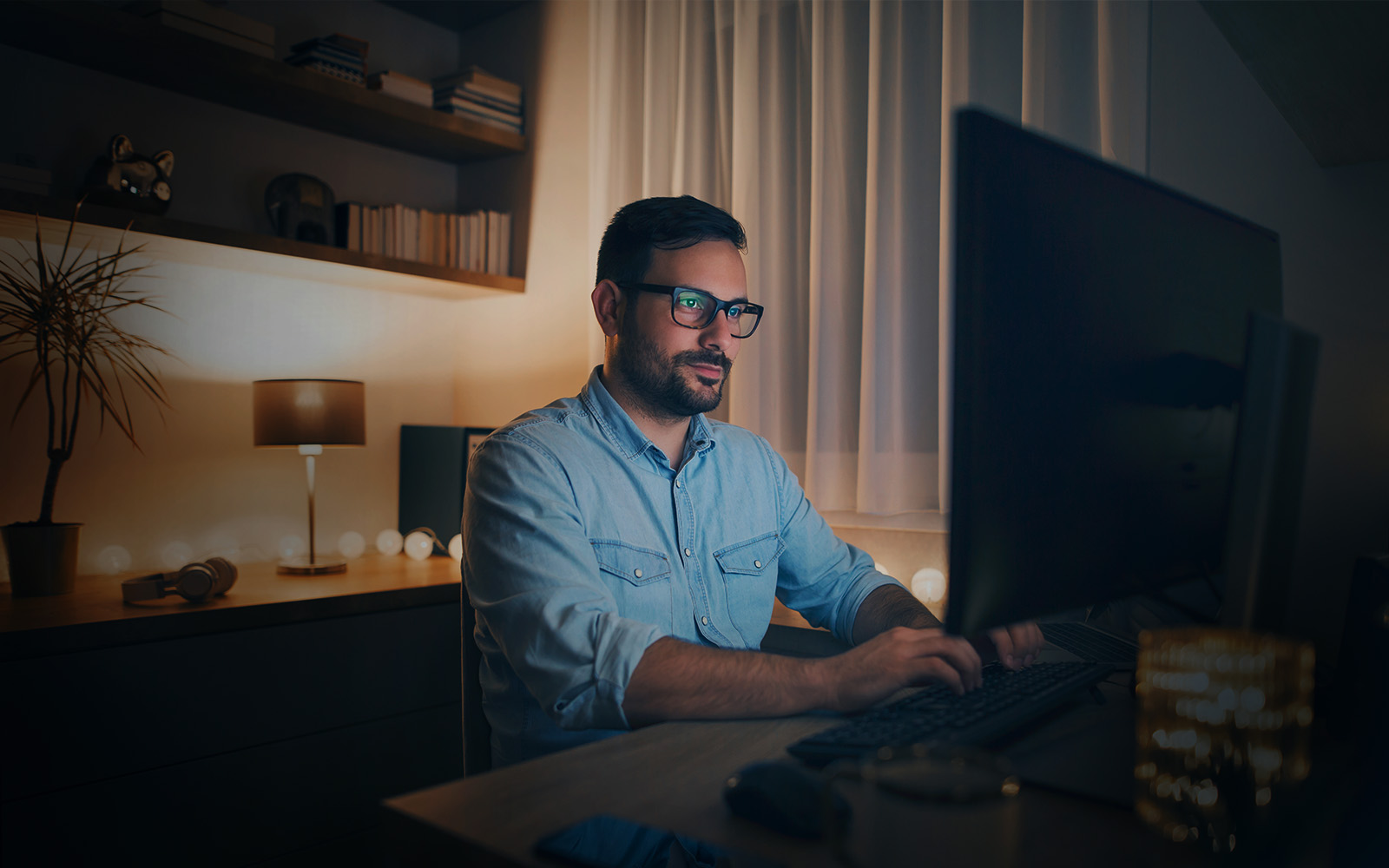 Man sitting at desk working from home