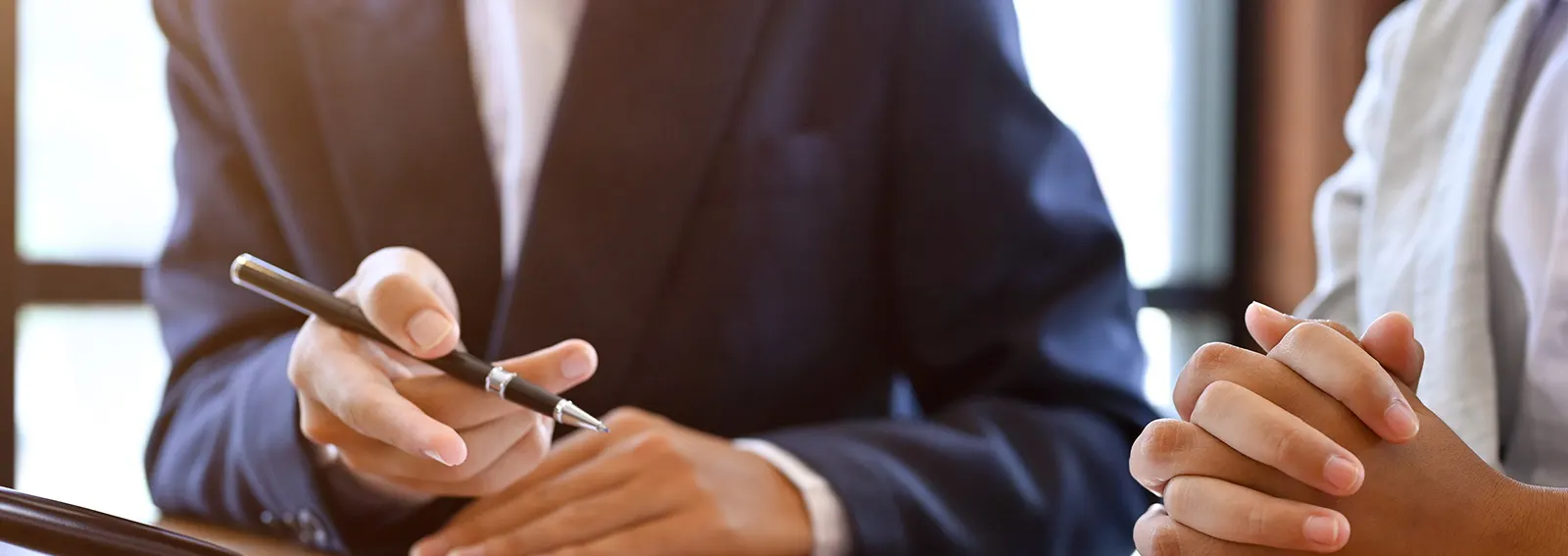 lawyer meeting, talking, and giving business investment strategy advice to his client