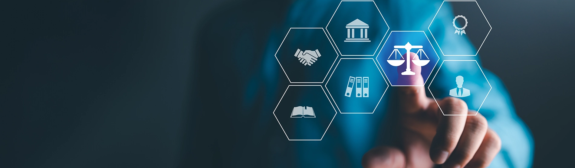 Person's hand hovering over icons representing anti-money laundering and justice