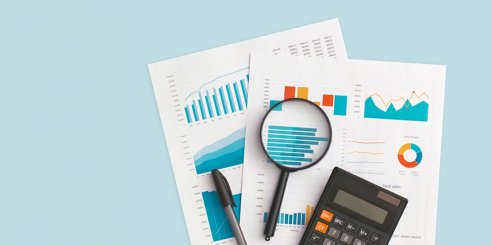Image of harts, graphs, and financial documents.