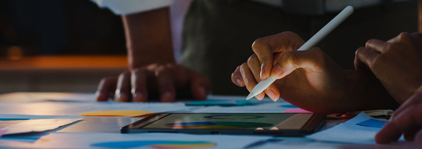 business owner reviewing financial documents on a tablet