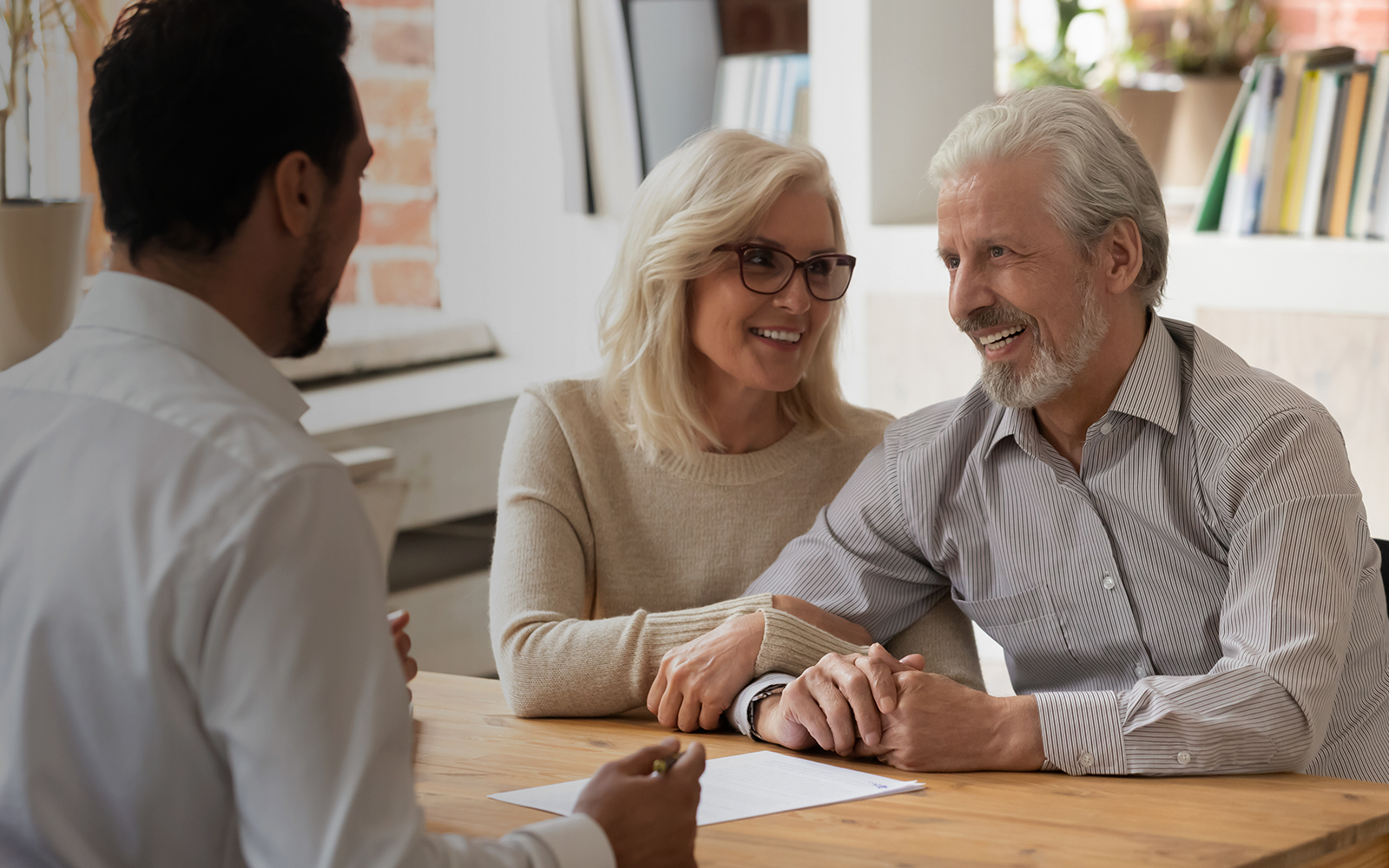 couple discussing business with representative