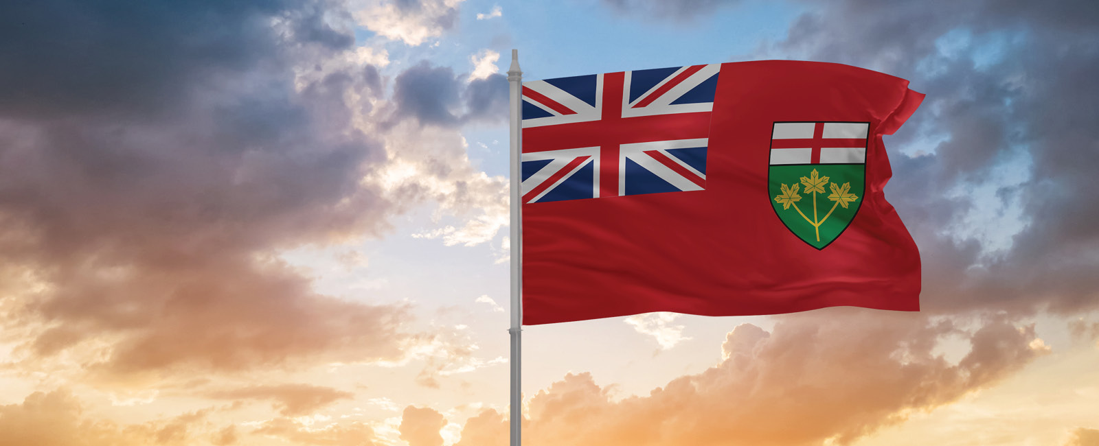 Ontario flag blowing in the sunset