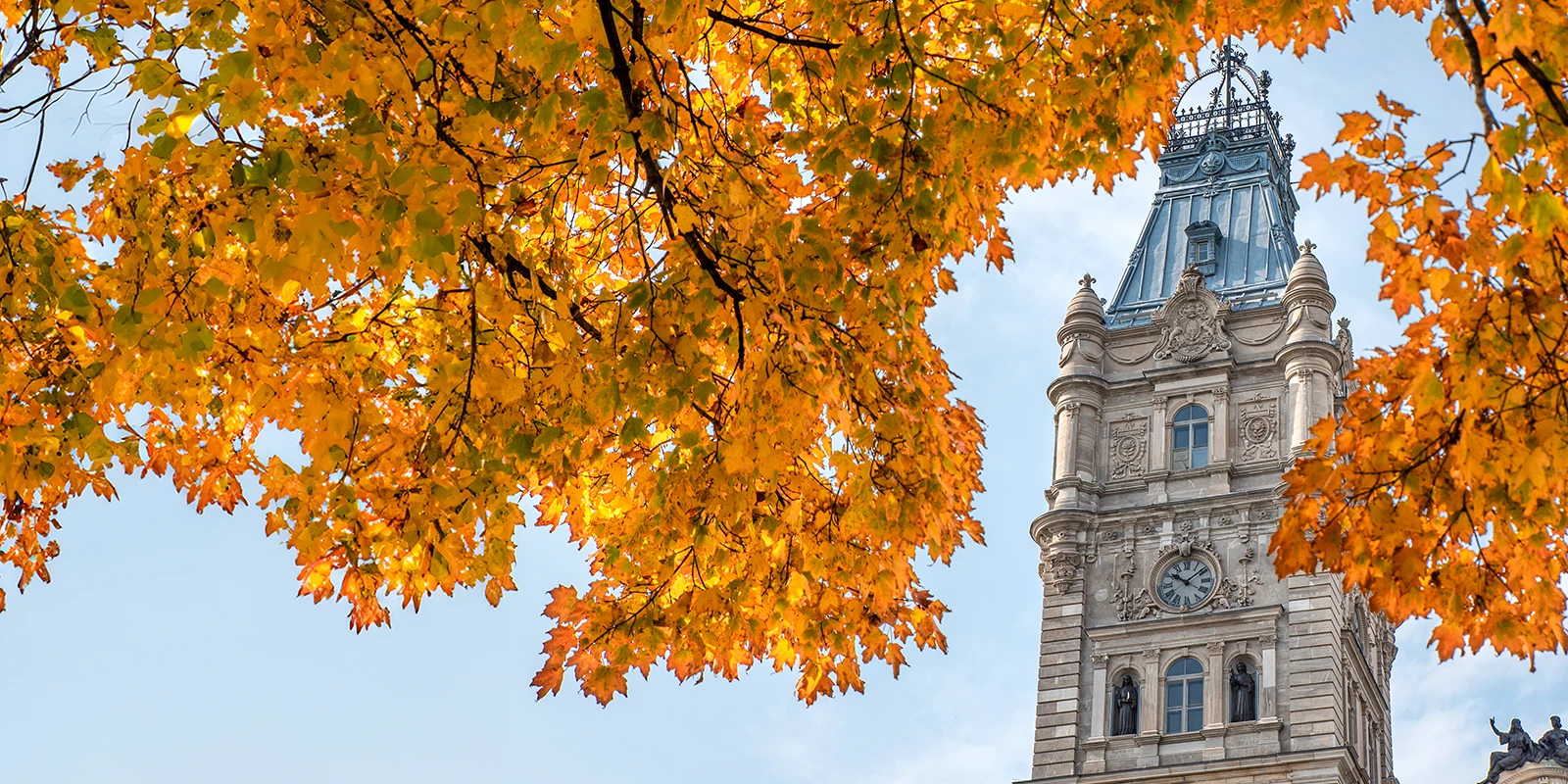 autumn leaves over parliament in Quebec