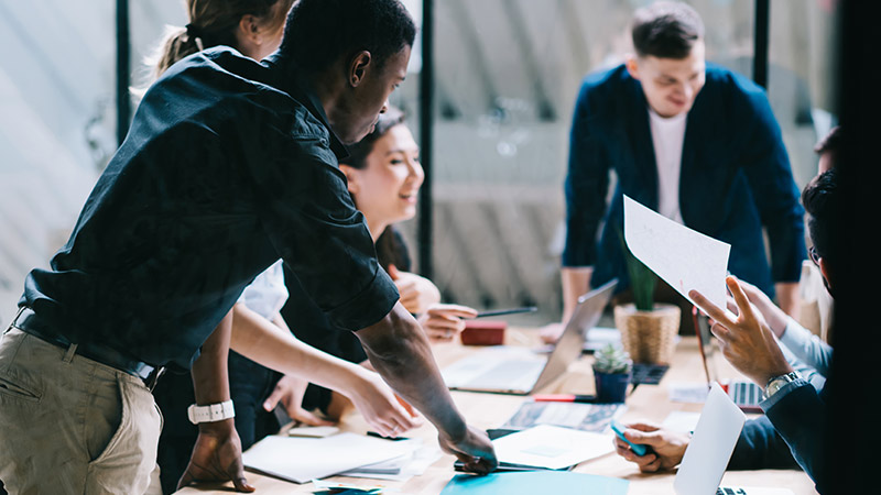 Business people working together at desk